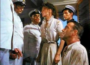 Captain: "Who are you?" Rosie: "Miss Rose Sayre." Captain: "English?" Rosie: "Of course." [Image Credit: The African Queen, John Huston's 1951 film starring Hepburn and Bogart] https://youtu.be/gc9QYyzw9VA?t=1h38m14s